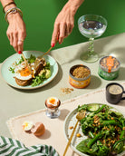 feeling salty punch food toppers savoury scene with hands and green background