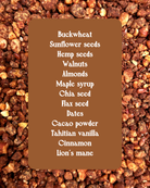 List of ingredients on a brown card with a background of various seeds and nuts.